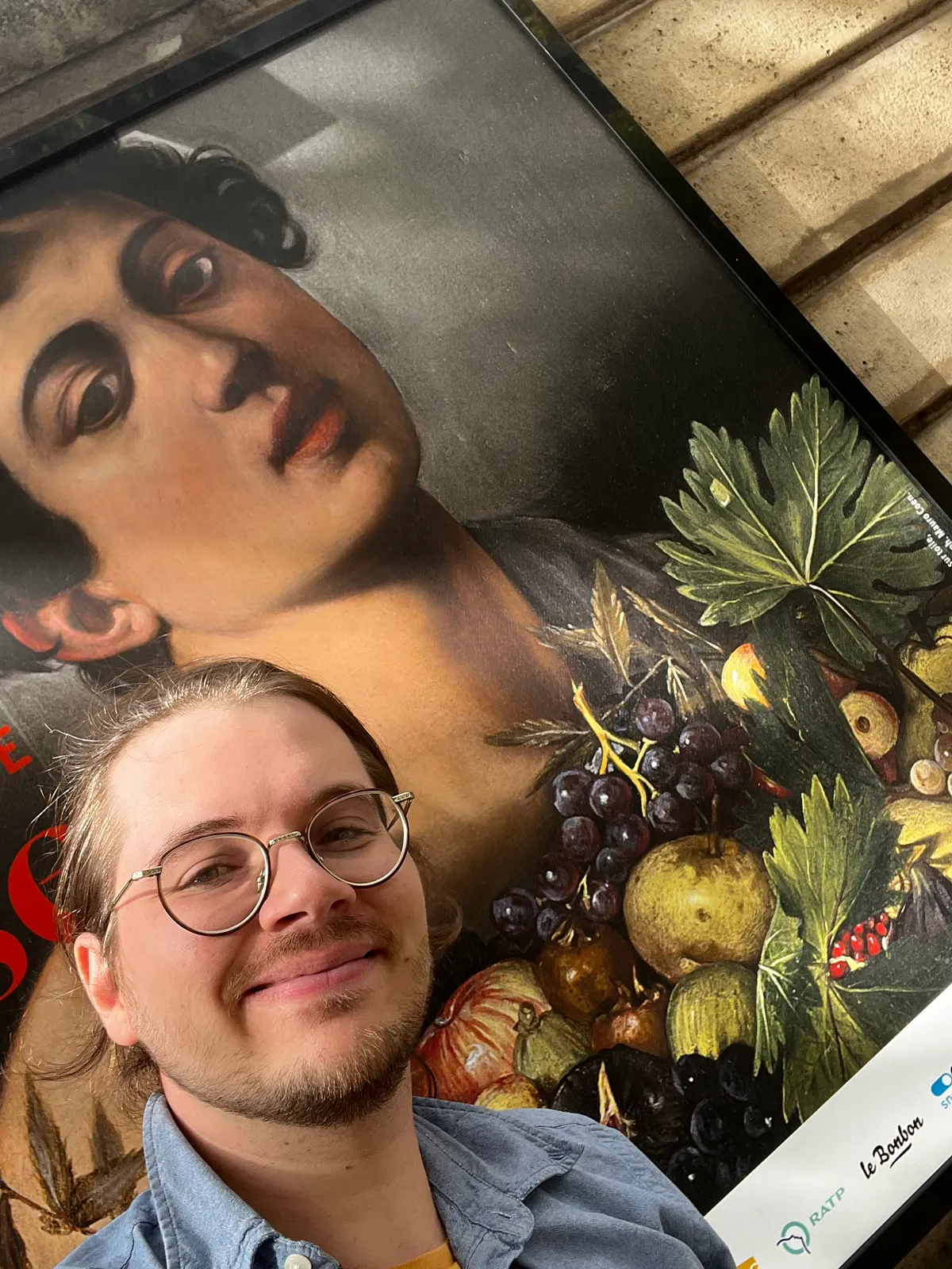 Simon in front of Caravaggio's Boy with a Basket of Fruit