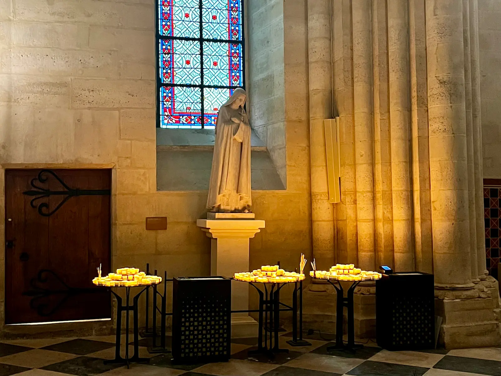 Candles inside Notre-Dame